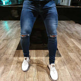 Calça Jeans Skinny Escura Rasgo No Joelho